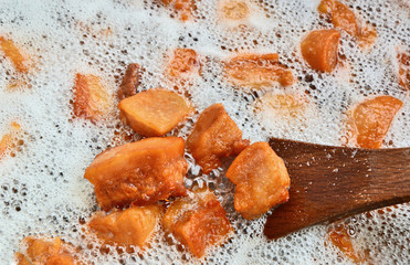 Pork Crackling from lard in oil cooking with Air bubble.