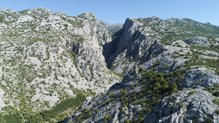Fototapeta na wymiar The Mala Paklenica karst river canyon is within national park, Velebit, Croatia. It is famous for hiking in undisturbed nature within deepest canyon in a region.