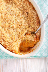 Pumpkin souffle dessert with crumble topping