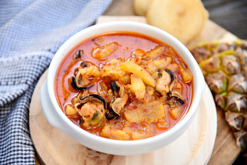 Pineapple and  Mussel Curry coconut soup (Thai name is Gang Kua Supparod)