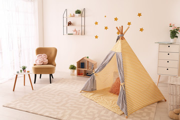 Cozy child's room interior with play tent and toys