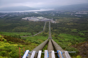 Penstocks carrying water to Fort William aluminium smelter plant, Loch Linnhe in background, cloudy...