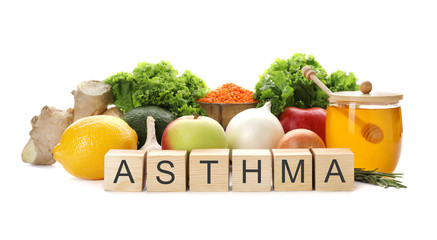 Natural products and cubes with space for text on white background. Home remedies for asthma