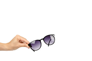 Stylish plastic sunglasses with hand isolated on white background, copy space template