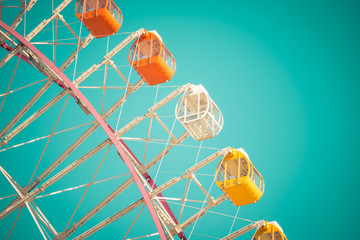 Giant ferris wheel on blue sky - Travel and recreation in amusement theme park holiday concept,...