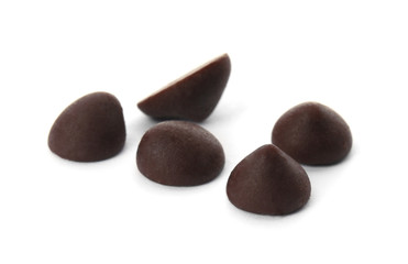 Fototapeta na wymiar Delicious dark chocolate chips on white background