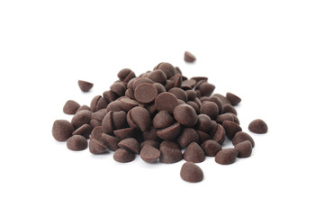 Naklejka premium Pile of delicious dark chocolate chips on white background