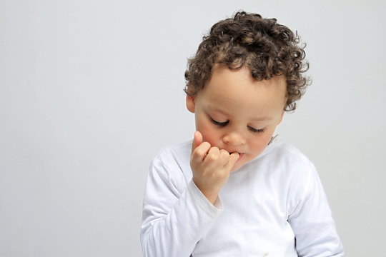 Little Boy Biting His Nails