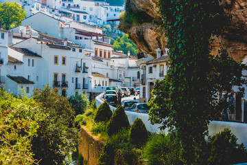 Buildings constructed under huge large rocks in Setenil de las Bodegas, Spain © Rui