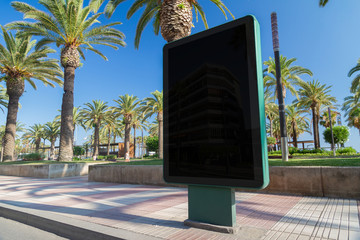 Outdoor billboard advertisement in seaside resort city mockup