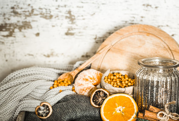 Still life with orange and sea buckthorn