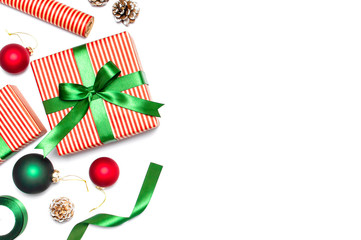 Gift boxes, Christmas balls, toys, fir cones, ribbon on white background. Festive, congratulation, New Year Christmas presents Xmas holiday 2019 greeting card. Flat lay, top view, copy space.