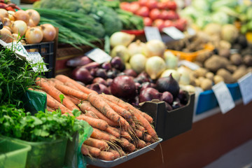 Different colorful vegetables on marketplace in autumn