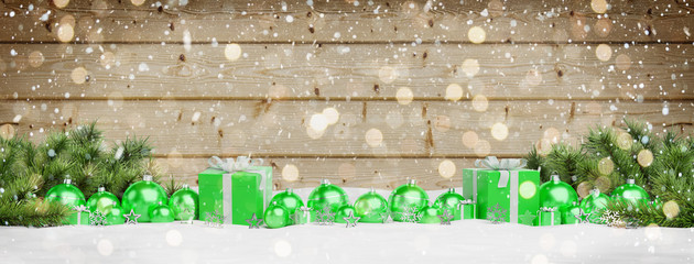 Green christmas baubles and gifts lined up 3D rendering