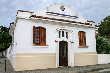 White colonial house in historic quarter of Colonia del Sacramento, Uruguay.