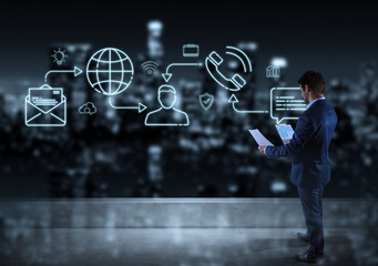 Businessman watching thin line social network icons interface