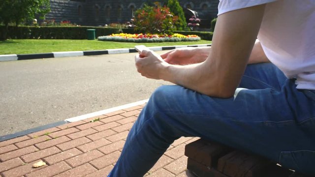 Man with phone in hands close-up