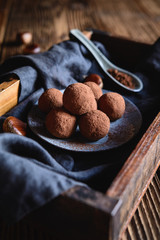 Chestnut truffles coated with cocoa powder