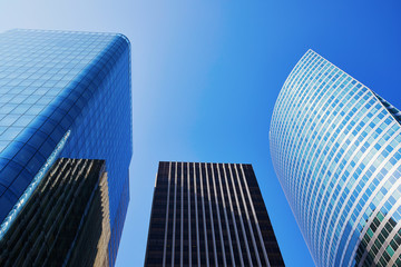 Skyscraper buildings over the blue sky