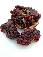 Pomegranate grains on white background