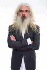 Studio shot of senior bearded businessman wearing eyeglasses wit