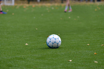 soccer ball on an artificial turf field