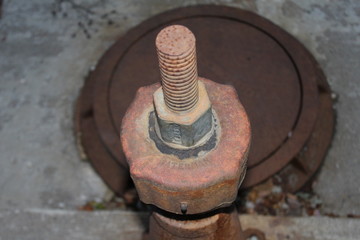 Large rusted metal bolt