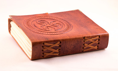 Old leather book white background