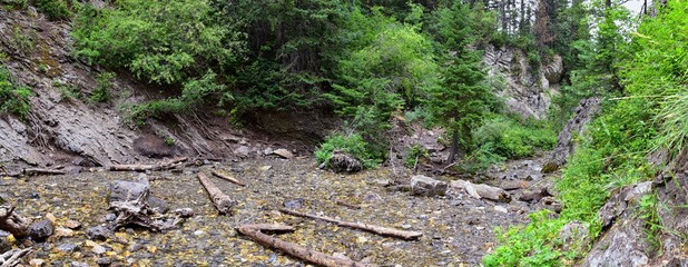 Waterfall and river stream Mountain views from hiking trails to Doughnut Falls in Big Cottonwood Canyon, in the Wasatch front Rocky Mountains, Utah, Western USA.
