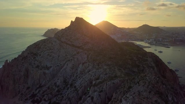 Aerial Rising: High Peak of Mountain in Rock Cliffs