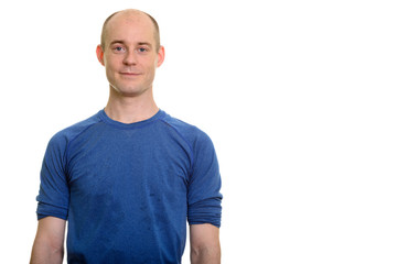 Fototapeta premium Studio shot of bald Caucasian man standing