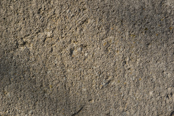 Rough natural stone seamless marble texture surface with cracks, dents, sharp edges. Gray grungy textured backdrop