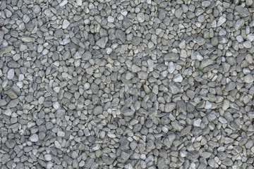 Small chips of marble for landscaping close-up, textured background.