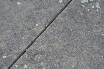 Fototapeta premium Rough natural stone seamless marble texture surface with cracks, dents, sharp edges. Gray grungy textured backdrop