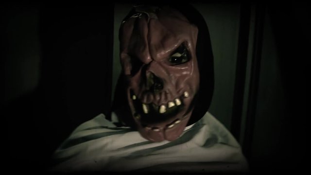 Pumpkin mask ghost with jump scare moment