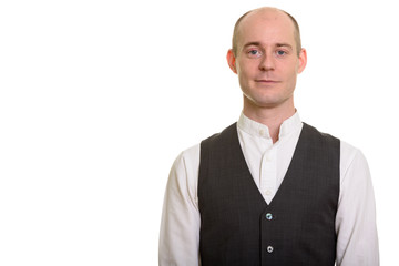 Portrait of balding Caucasian man wearing vest
