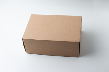 Cardboard Box or brown paper box on white background