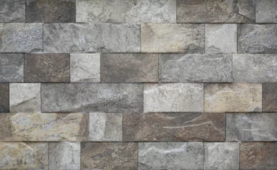 Photo sur Plexiglas Pierres Mur de briques de texture de tuile de pierre grise moderne en gros plan