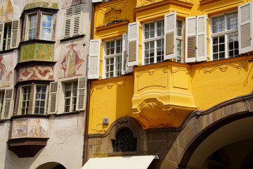 Traditional frescoes on alpine balconie