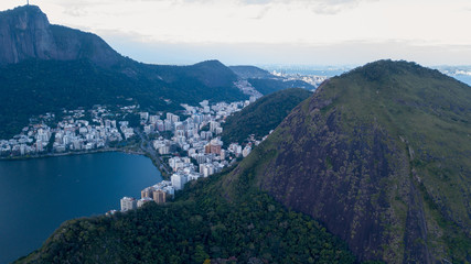 Obraz na płótnie Canvas aerial view of the drone of the lagoon in rio de janeiro and copacabana, at dusk