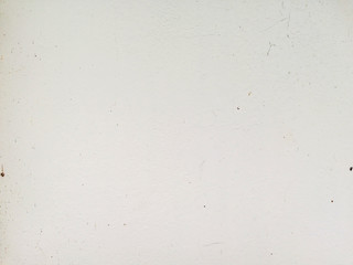 Old white cement wall with crack