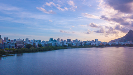 Fototapeta premium aerial view of the drone of the lagoon in rio de janeiro and copacabana, at dusk