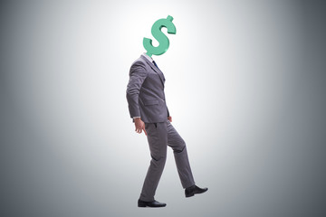 Businessman with dollar sign instead of head