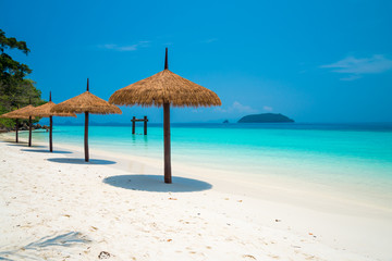 Beautiful tropical island white sand beach blue sky sunny day - Summer breeze holiday