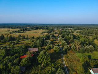 View of the village from the height, forests and fields around