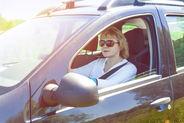 Naklejka premium Woman car driver