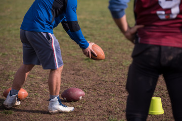 american football team with coach in action