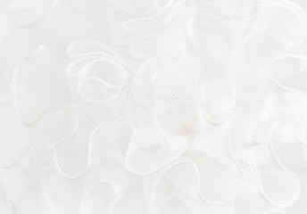 Closeup of white fabric frills