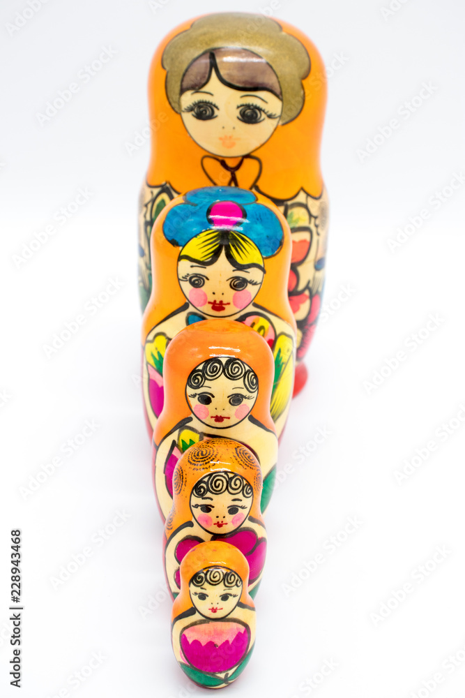 Wall mural Russian toy matryoshka, on a white background