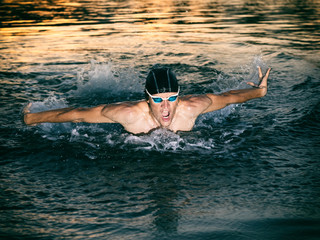 Fototapeta premium Swimmer breathing during swimming butterfly
